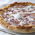 "Scorched" tart with cottage cheese, bacon, and onions