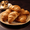 A plate of golden and flaky croissants