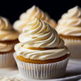 Homemade vanilla cupcakes with buttercream frosting